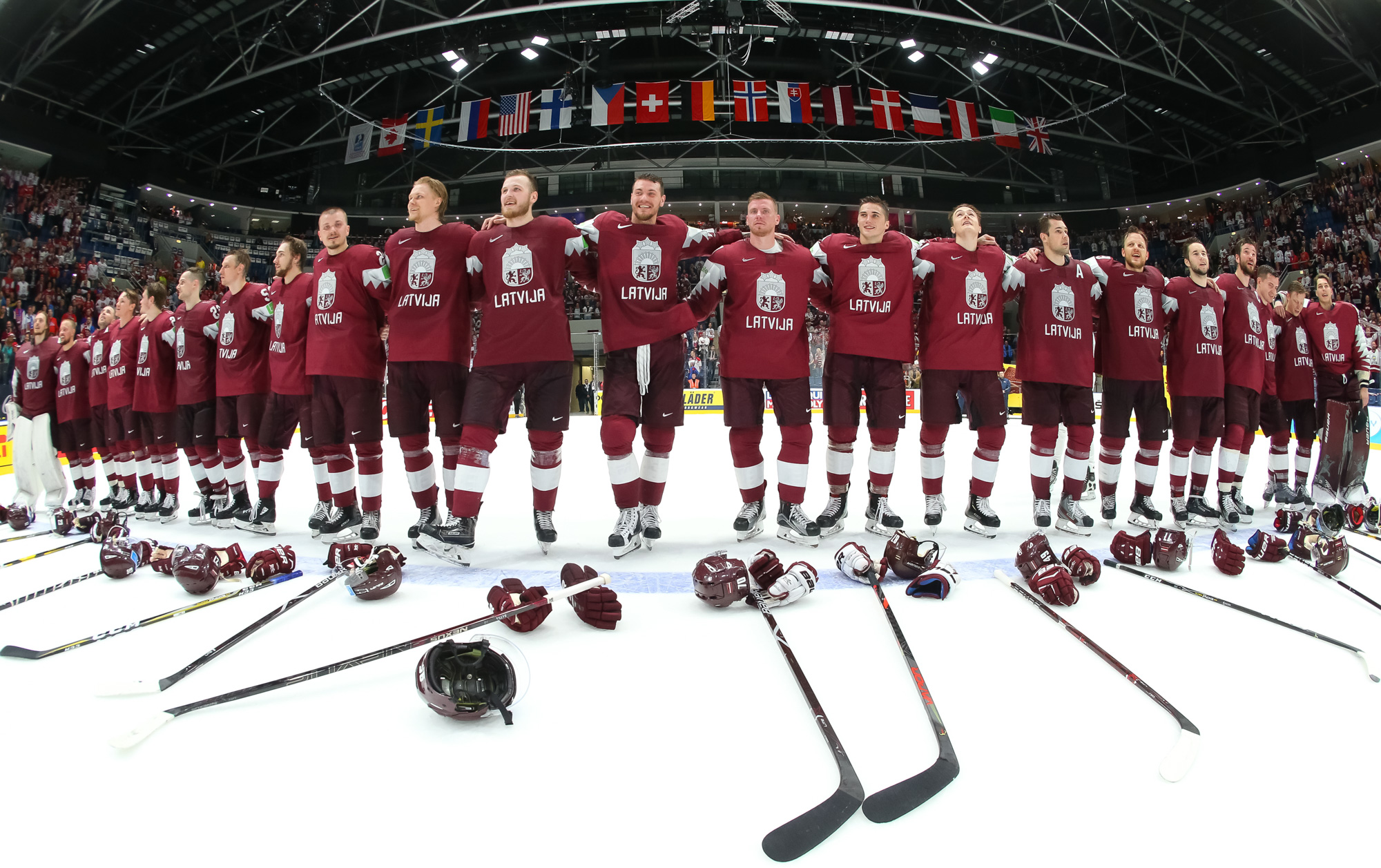 IIHF Latvia opens with a win