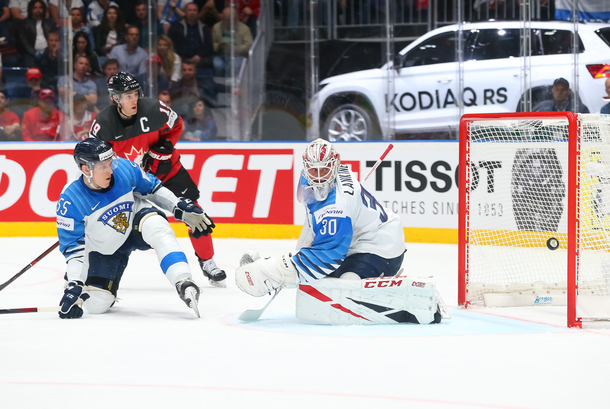 Canada's Shea Theodore (27) celebrates after scoring a goal against Finland  goaltender Kevin Lankinen (30) during the Ice Hockey World Championships  gold medal match at the Ondrej Nepela Arena in Bratislava, Slovakia