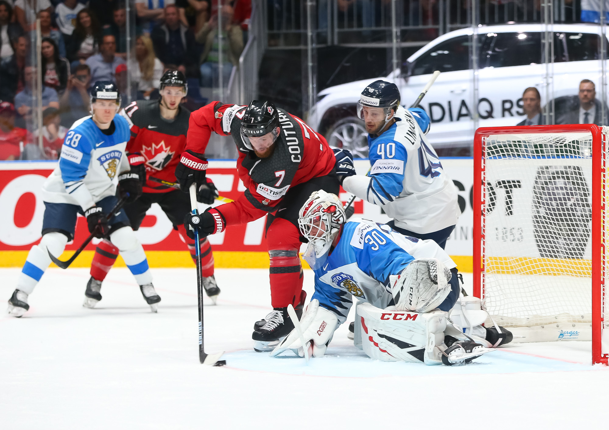 Canada's Shea Theodore (27) celebrates after scoring a goal against Finland  goaltender Kevin Lankinen (30) during the Ice Hockey World Championships  gold medal match at the Ondrej Nepela Arena in Bratislava, Slovakia