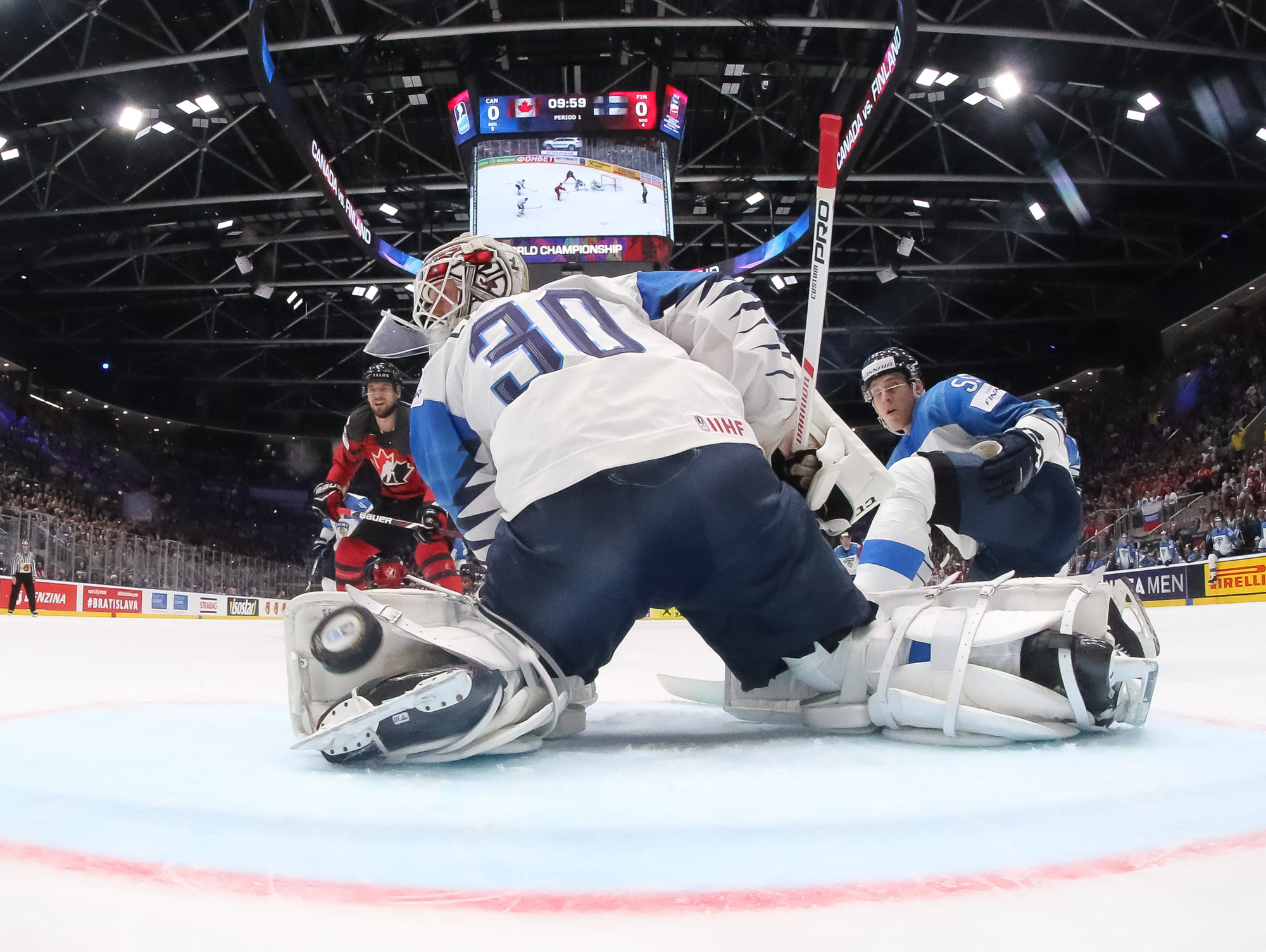 Canada's Shea Theodore (27) celebrates after scoring a goal against Finland  goaltender Kevin Lankinen (30) during the Ice Hockey World Championships  gold medal match at the Ondrej Nepela Arena in Bratislava, Slovakia