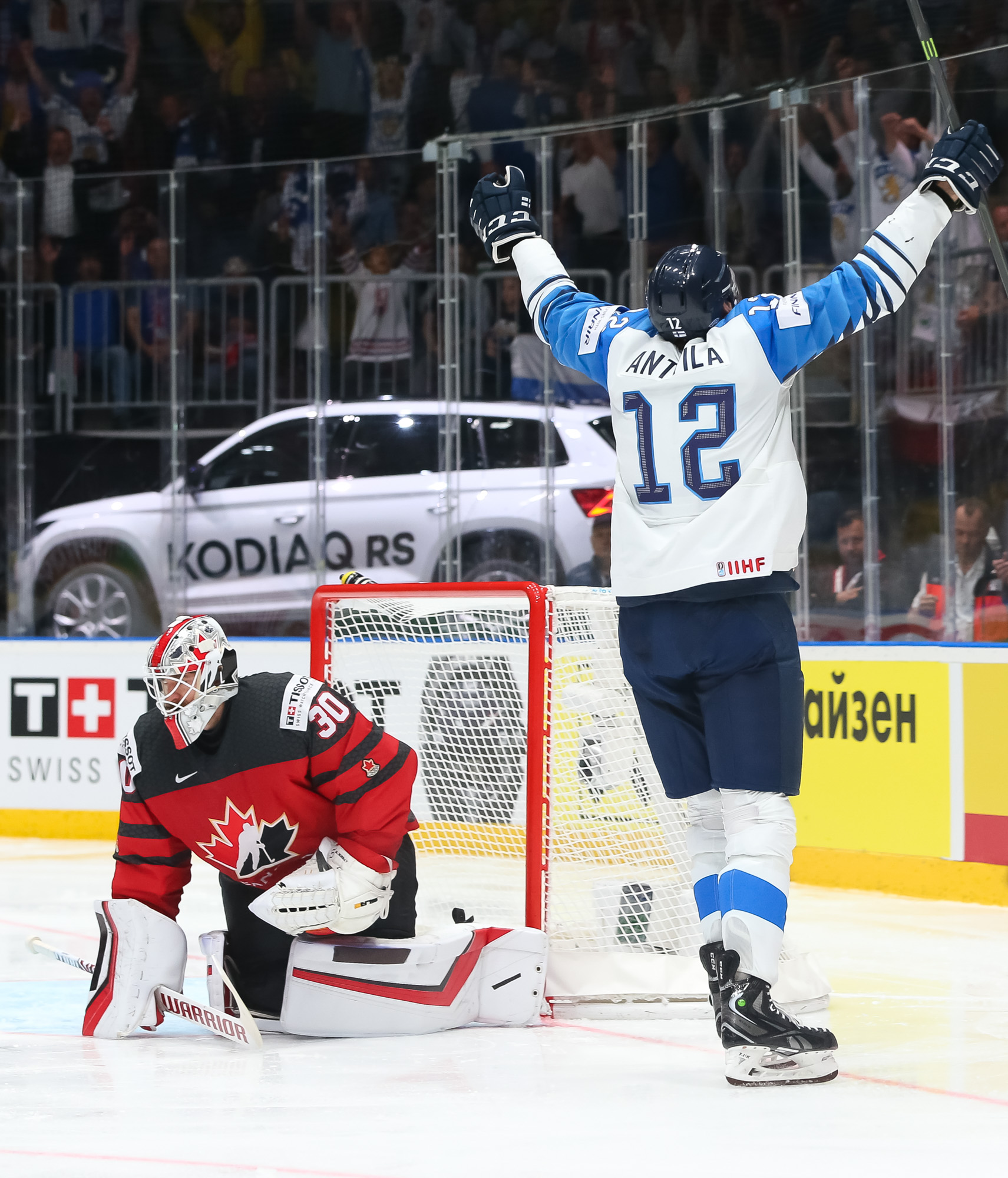 Canada's Shea Theodore (27) celebrates after scoring a goal against Finland  goaltender Kevin Lankinen (30) during the Ice Hockey World Championships  gold medal match at the Ondrej Nepela Arena in Bratislava, Slovakia