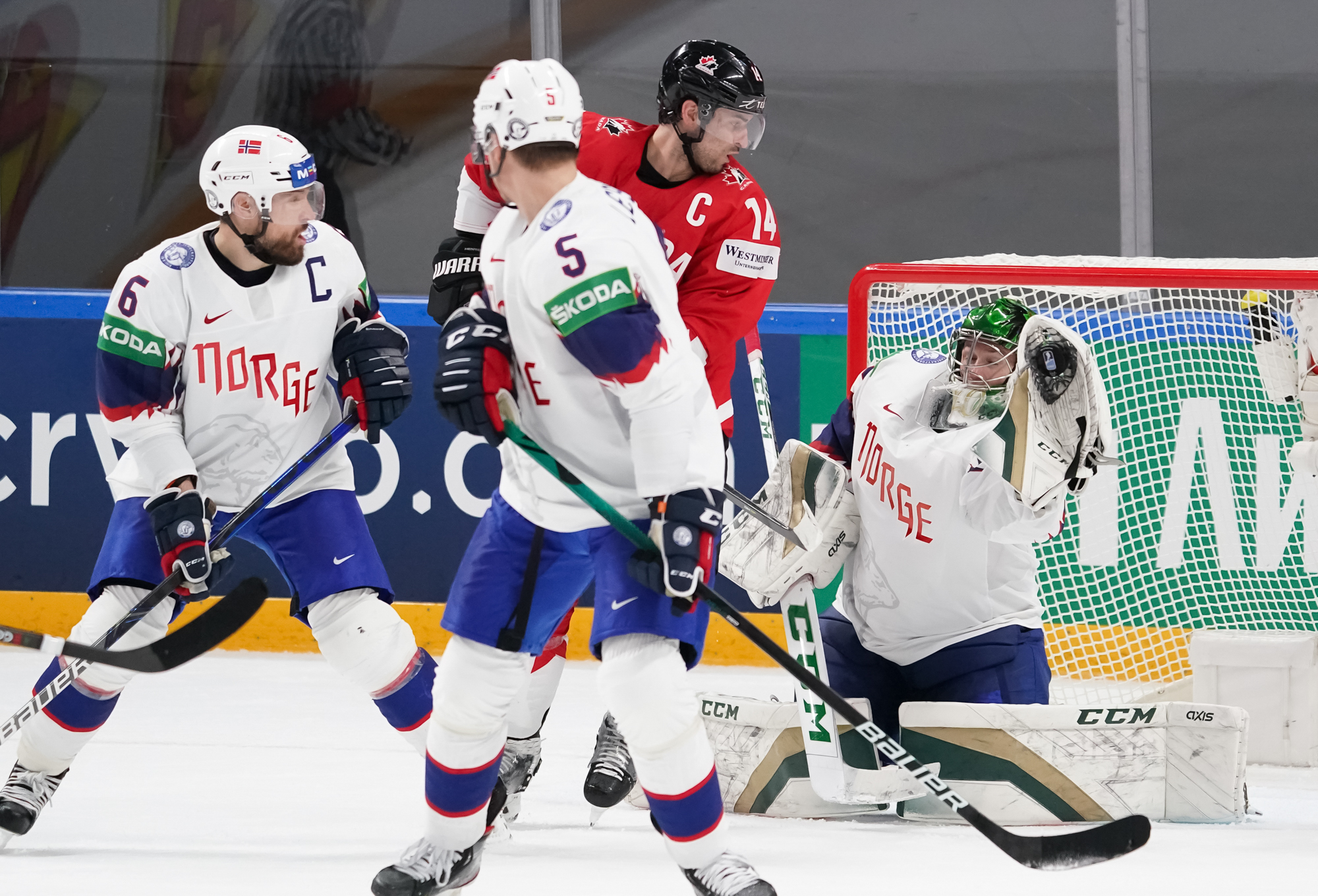 IIHF Canada wins mustwin game