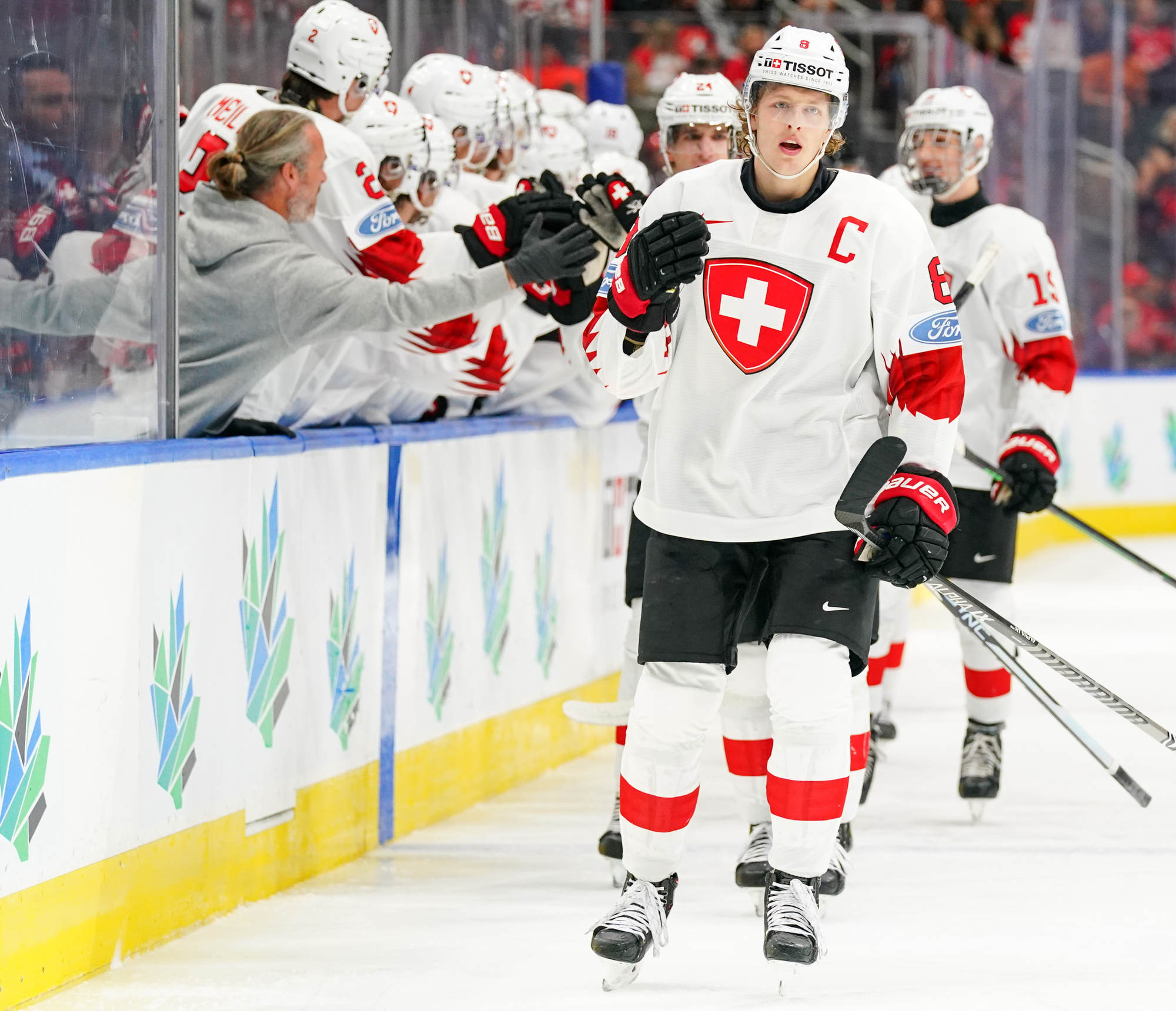 IIHF - Canada Outguns Swiss To Advance