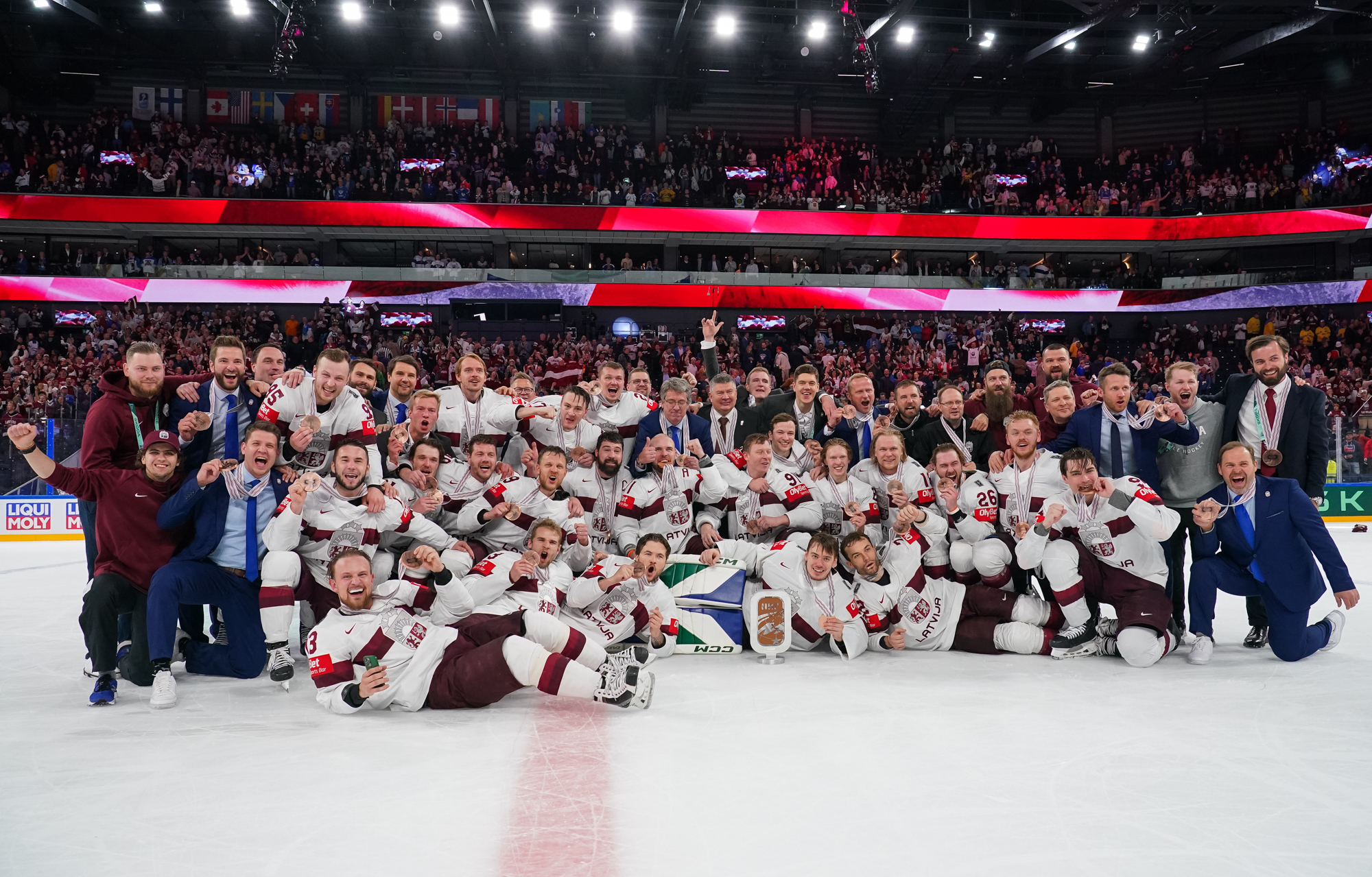 IIHF Latvia wins historic bronze in OT
