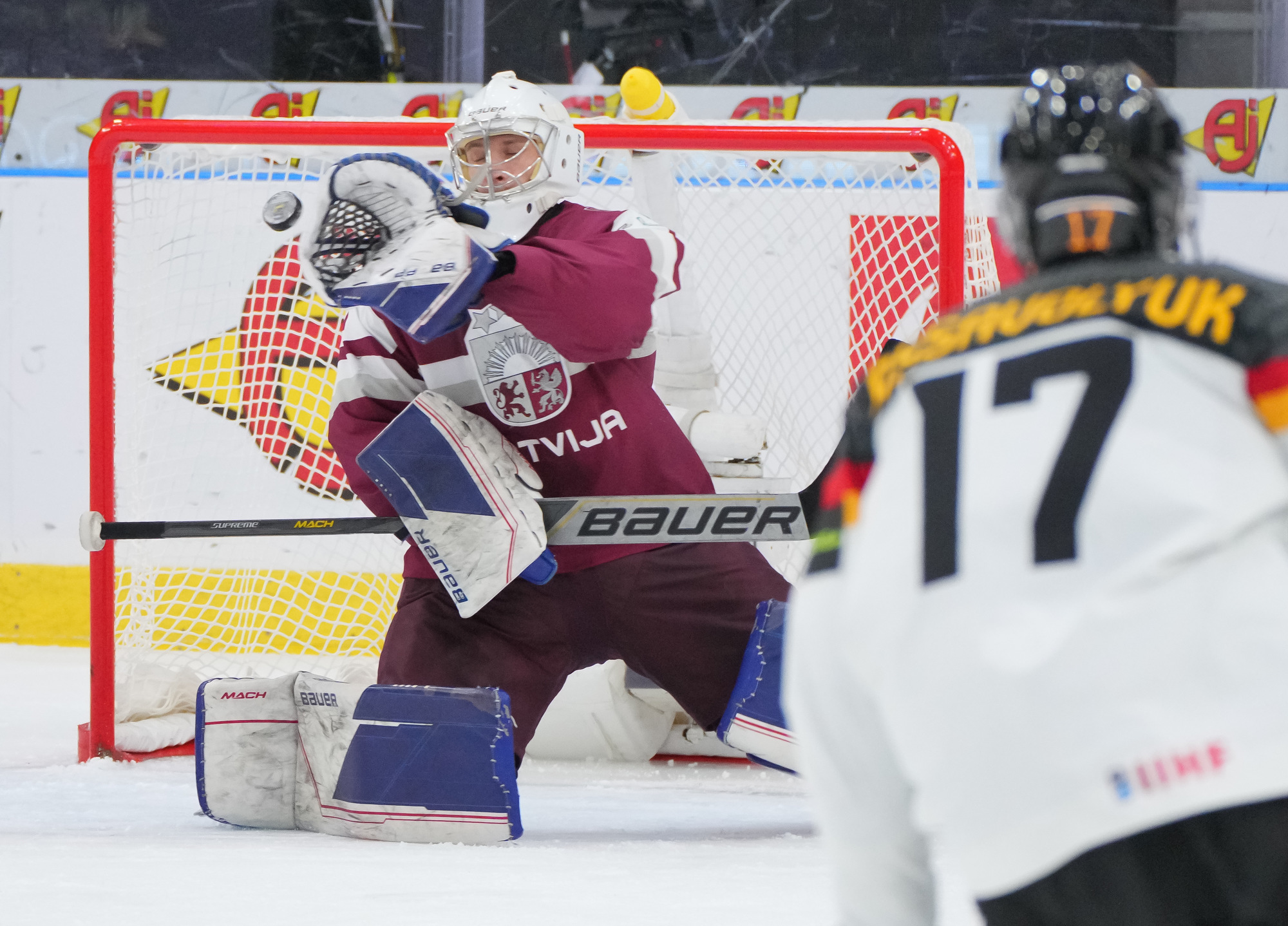 IIHF Latvia Pounds Germany To Stay Alive   20231230 379350 Mz 