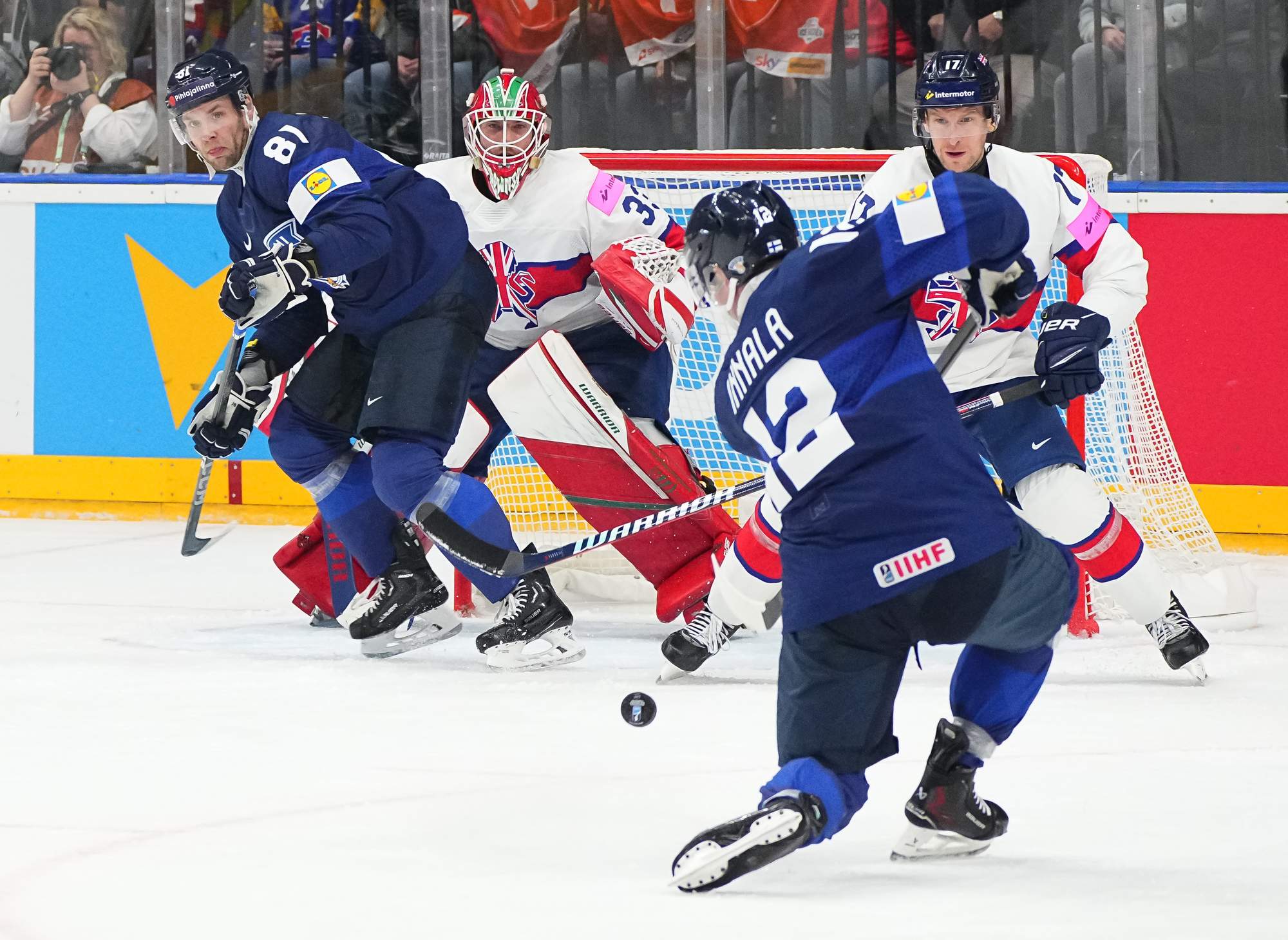 IIHF Finns thrash British for first win