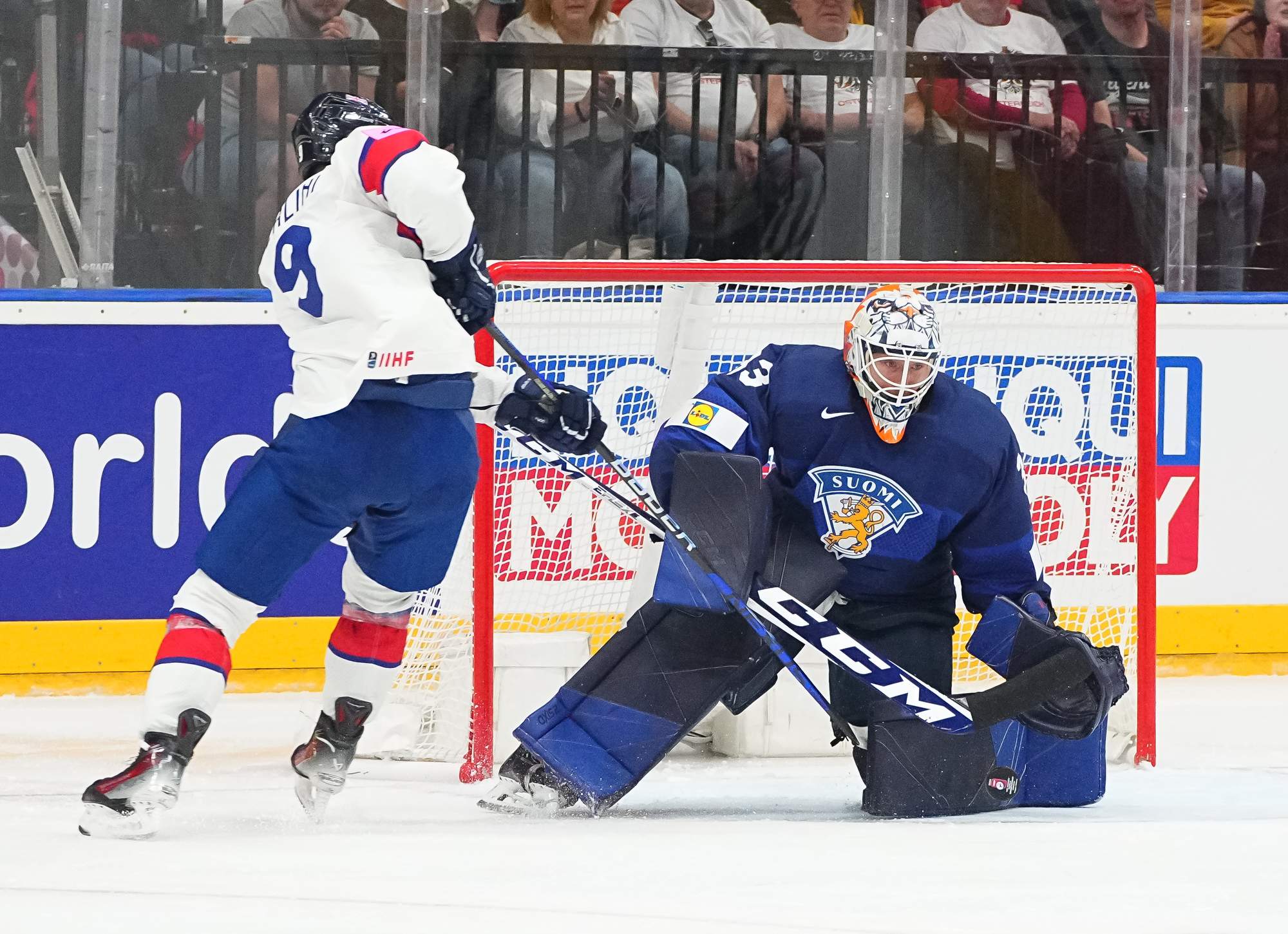 IIHF Finns thrash British for first win