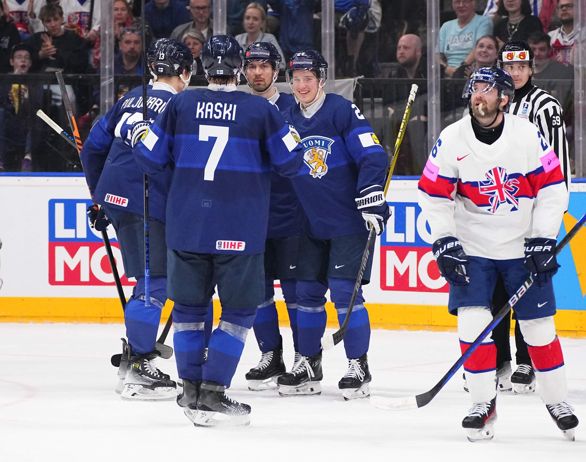 IIHF Finns thrash British for first win