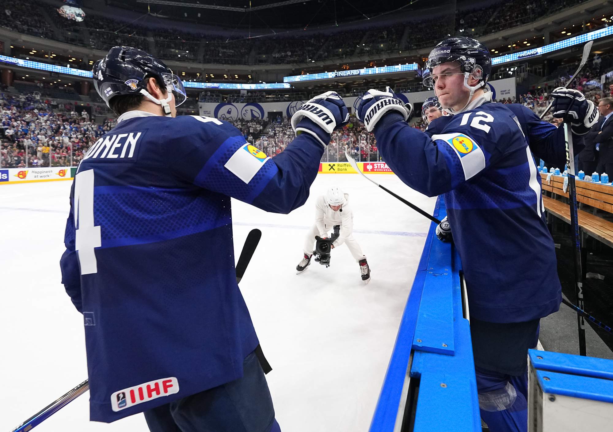 IIHF Finns thrash British for first win